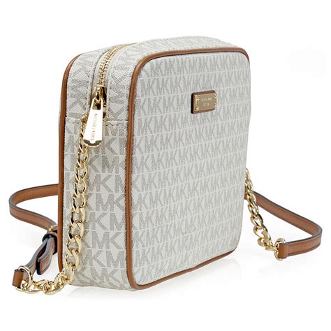 michael kors vanilla jet set crossbody|bolso Michael Kors jet set.